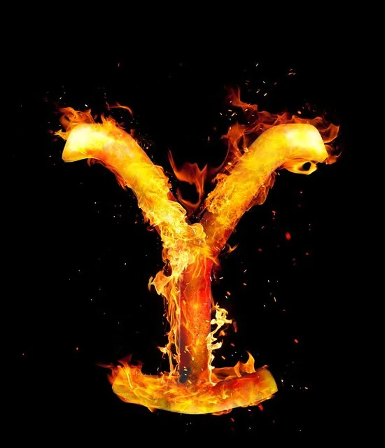 The Yellowstone Y cattle-brand logo engulfed in flame and sparks on black
