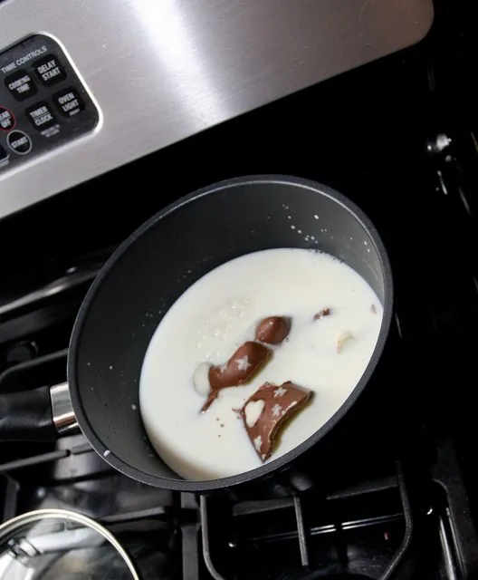 santas in hot milk