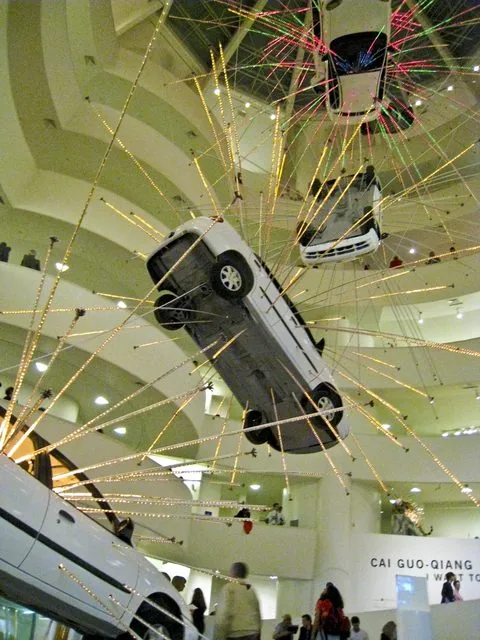 a car falling forever up the guggenheim