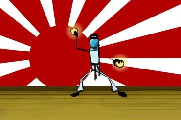 A figure on a stage with arms spread against a red and white rising-sun backdrop, holding the bulb aloft